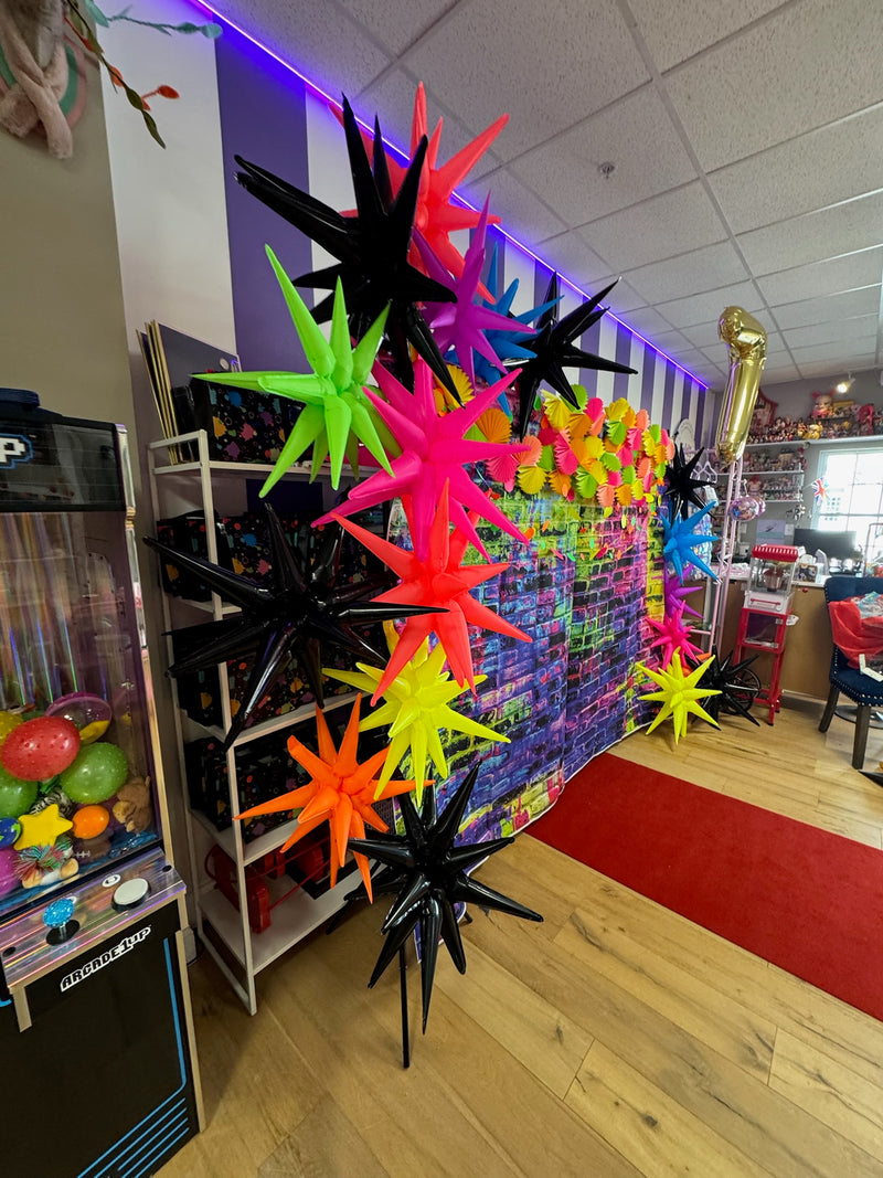 The colorful Violet's Crayon party backdrop and celebration space